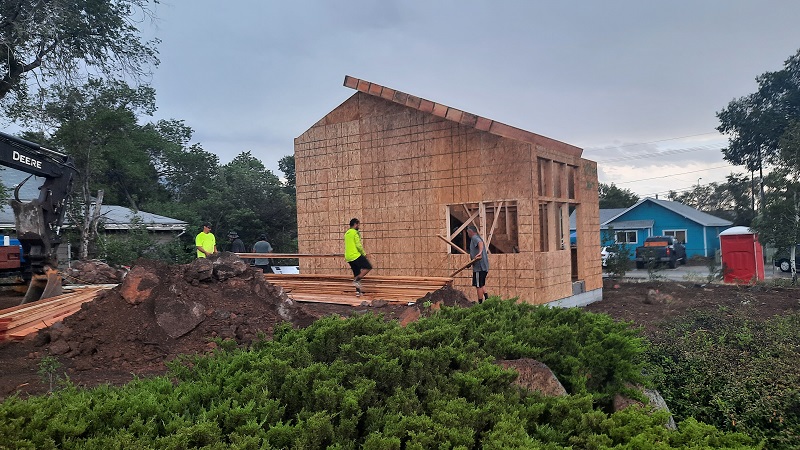 Workers frame small scale home on Butler Ave and O'Leary to promote affordable homeownership