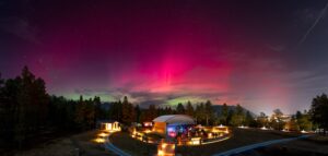 Purple northern lights over the open deck observatory at Lowell Observatory